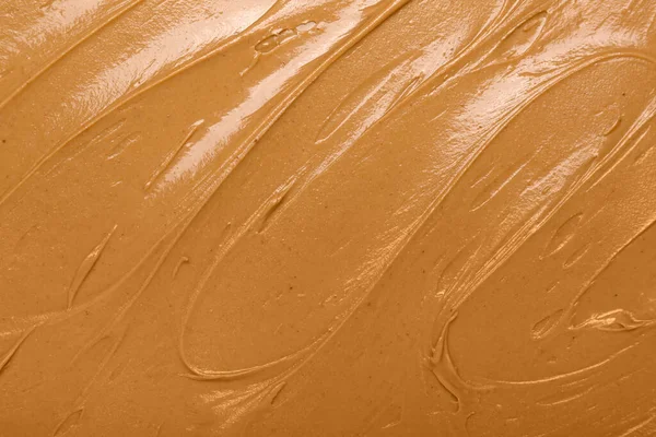 Texture of nut butter as background, closeup