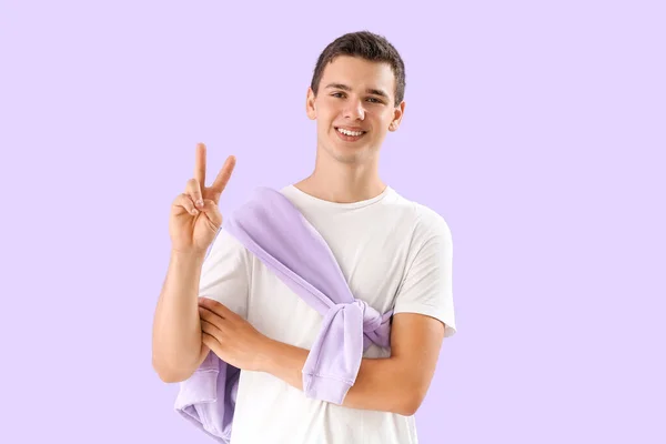 Teenage Boy White Shirt Showing Victory Gesture Lilac Background — Stock Photo, Image
