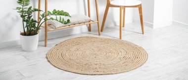 Wicker carpet on floor in room
