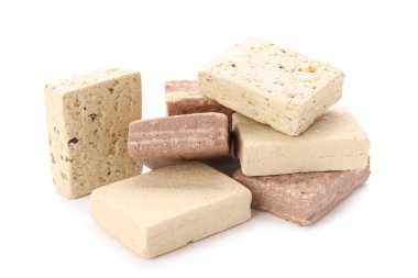 Heap of tasty sesame halva on white background