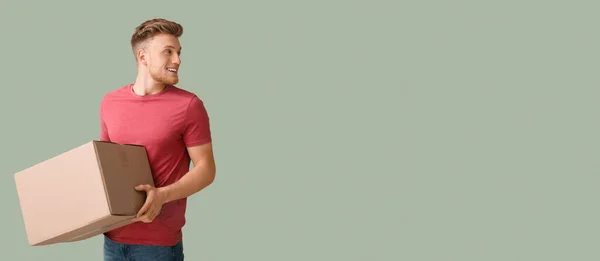 Young Man Cardboard Box Color Background Space Text — Stok fotoğraf