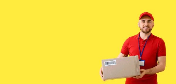 Handsome Delivery Man Parcel Yellow Background Space Text — Fotografia de Stock