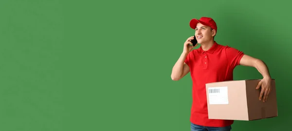 Delivery Man Parcel Talking Mobile Phone Green Background Space Text — Stok fotoğraf