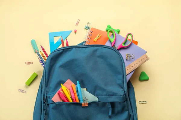 Blue Backpack School Stationery Beige Background — 스톡 사진