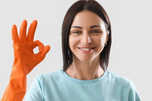 Beautiful Woman Rubber Glove Showing Light Background Closeup — Stockfoto