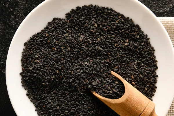 Bowl Scoop Black Sesame Seeds Closeup — Stock Fotó