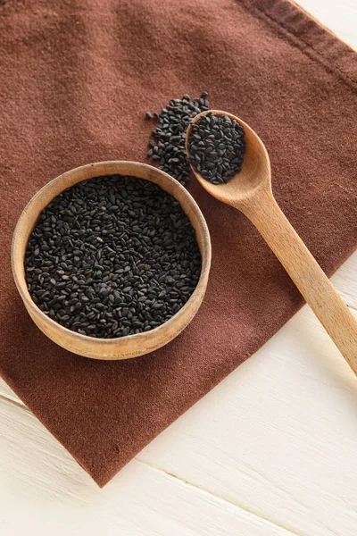 Bowl Spoon Black Sesame Seeds Light Wooden Background — Stock Fotó