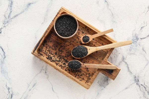 Wooden Board Bowl Spoons Black Sesame Seeds Light Background — Stock Photo, Image