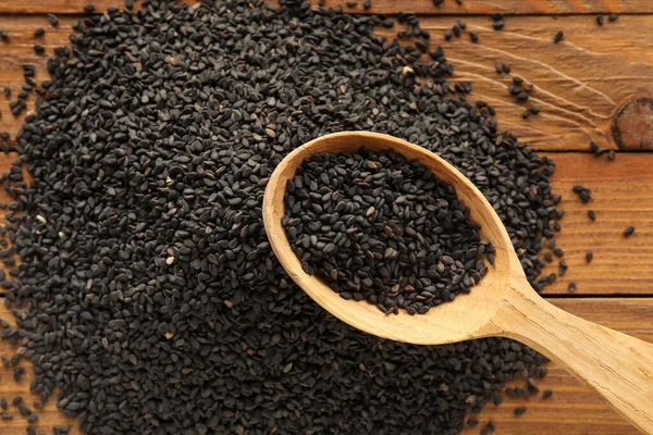 Spoon Black Sesame Seeds Wooden Table Closeup — Stockfoto