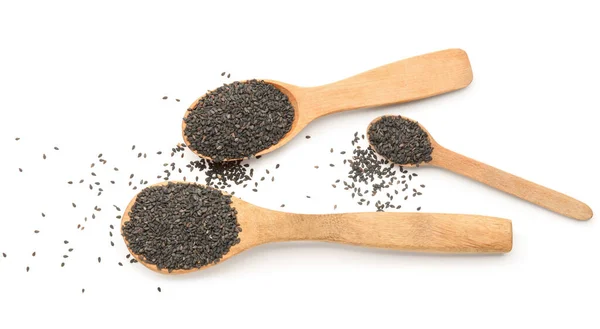 Wooden Spoons Black Sesame Seeds White Background — стоковое фото