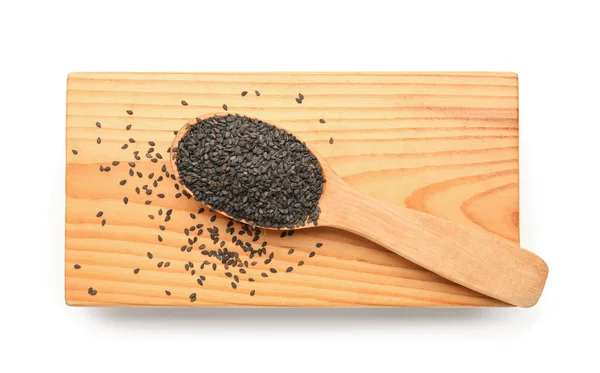 Wooden Board Spoon Black Sesame Seeds White Background — стоковое фото