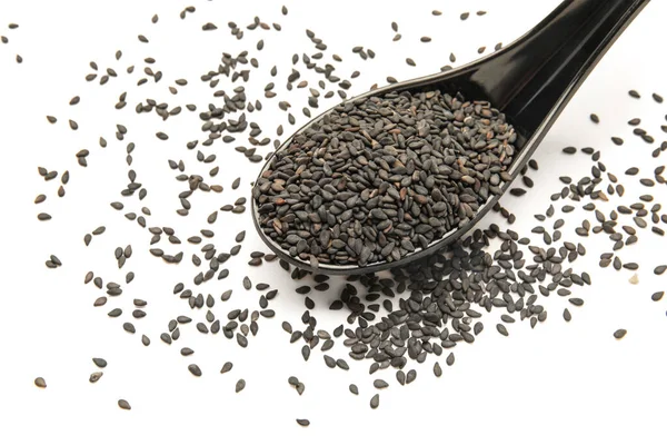 Spoon Black Sesame Seeds White Background Closeup — Stockfoto