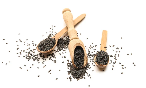 Scoop Spoons Black Sesame Seeds White Background — стоковое фото
