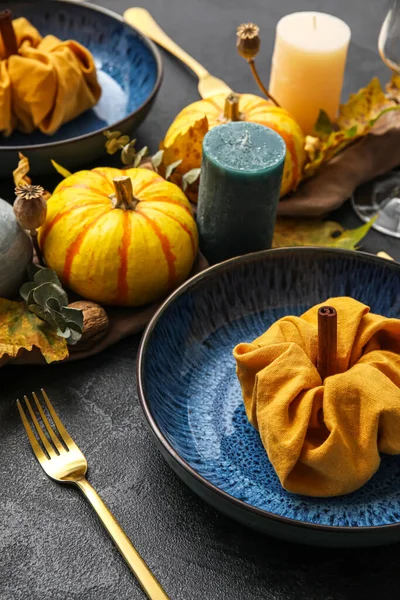 Beautiful Table Setting Pumpkins Candles Dark Background Closeup — Stockfoto