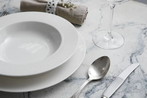 Plates Cutlery White Marble Table Closeup — Stock Photo, Image