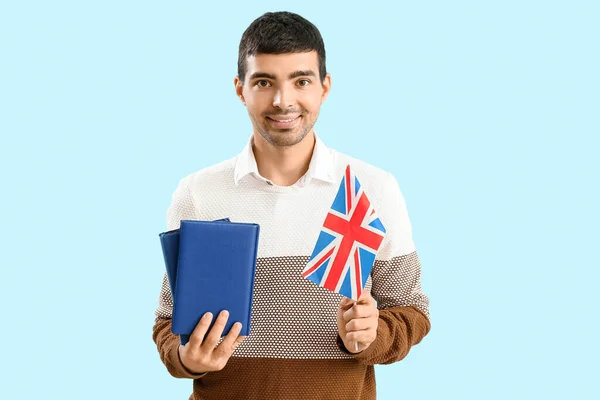 Young Man Flag Books Blue Background — Stock fotografie
