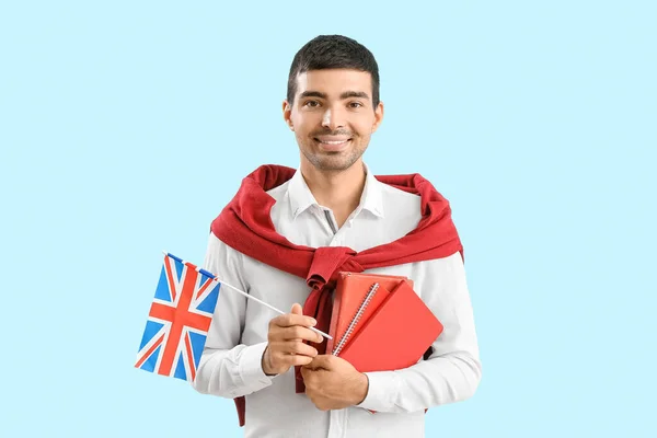 Young Man Flag Books Blue Background — Stock fotografie