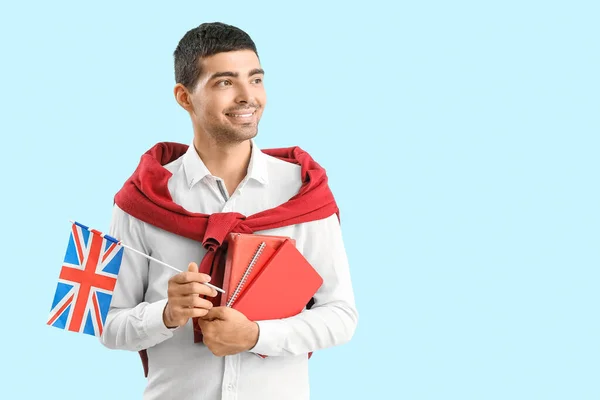 Young Man Flag Books Blue Background —  Fotos de Stock