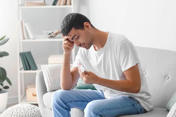 Upset Young Man Holding Tissue Nasal Blood Home — Stockfoto