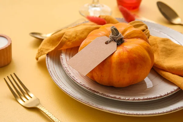 Table Setting Pumpkin Blank Card Yellow Background Closeup Stock Picture