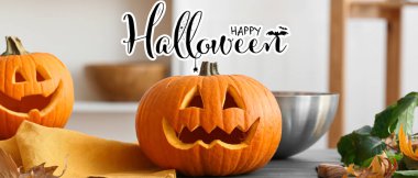 Greeting card for Happy Halloween celebration with carved pumpkins