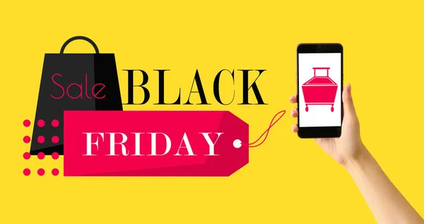 Hand Smartphone Text Black Friday Sale Yellow Background — стоковое фото
