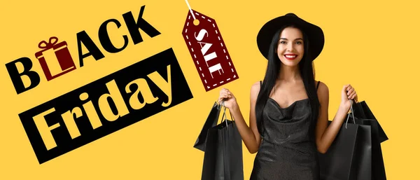 Beautiful Young Woman Shopping Bags Yellow Background Black Friday Sale — Stockfoto