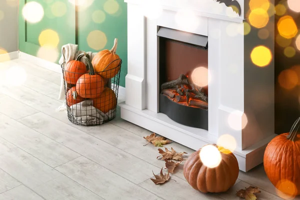 Fireplace decorated for Halloween party in room