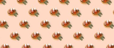 Bej arka planda bir sürü zeytinyağı var. Tasarım için desen