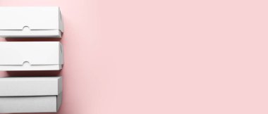 Pembe zemin üzerinde boş karton kutular metin için boşluk, üst görünüm