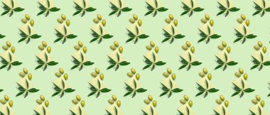 Yeşil arka planda zeytinyağı özü olan bir sürü sabun. Tasarım için desen