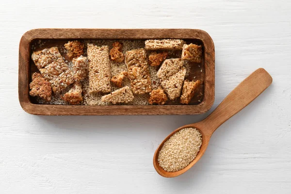 Board Pieces Tasty Sesame Kozinaki Light Wooden Background — Stock Photo, Image