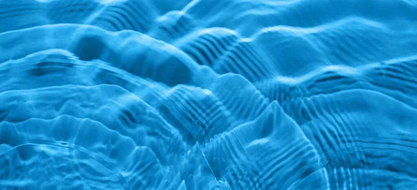 Surface of clean water with ripples. Banner for design