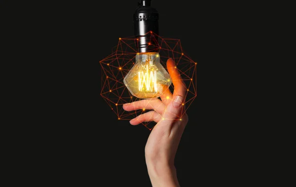 Female Hand Glowing Light Bulb Black Background — Stock Photo, Image