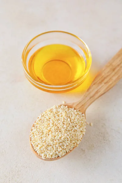 Spoon Sesame Seeds Bowl Oil Light Background — Stock Photo, Image