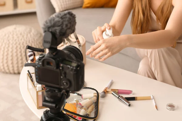 Female Beauty Blogger Applying Cosmetic Product Her Hand While Recording — Stock Photo, Image