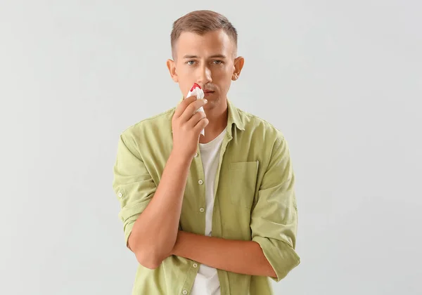 Young Man Nosebleed Tissue White Background — Photo
