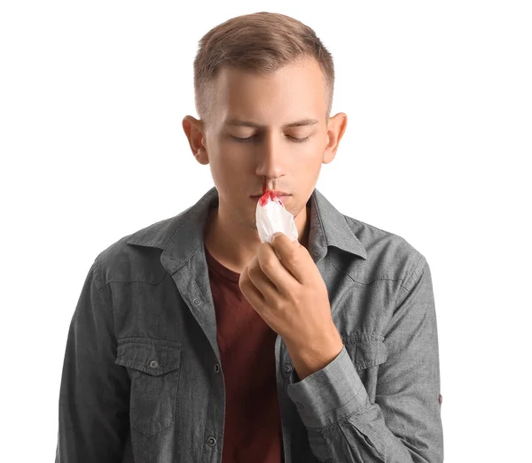 Homem Jovem Limpando Sangramento Nasal Com Tecido Fundo Branco — Fotografia de Stock