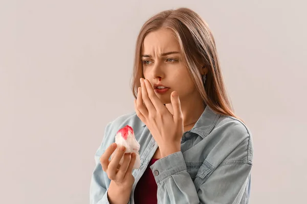 Young Woman Nosebleed Tissue Light Background — Stock Photo, Image