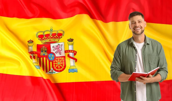 Muž Knihou Proti Španělské Vlajce Koncept Studia Španělštiny — Stock fotografie