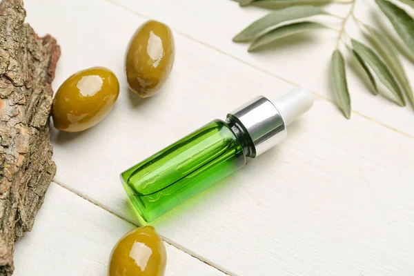 Bottle Essential Olive Oil Light Wooden Background Closeup — Stock Photo, Image