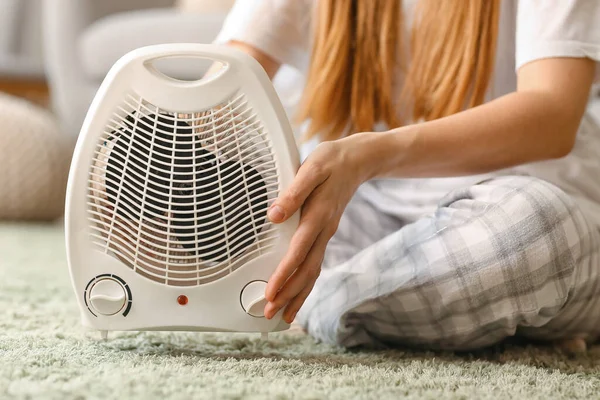 Woman Electric Fan Heater Sitting Carpet Home Closeup — Stockfoto