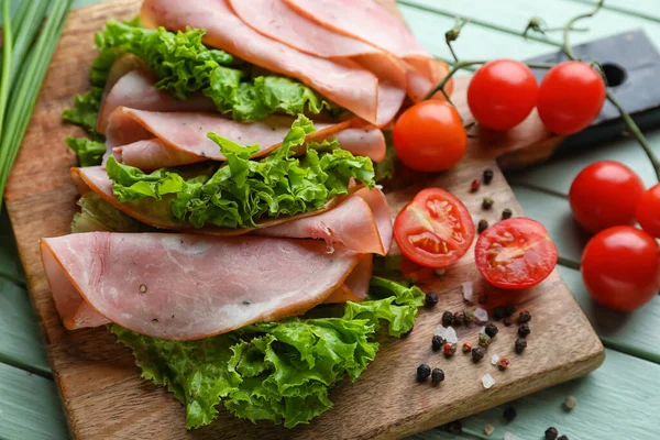 Board Slices Tasty Ham Lettuce Tomatoes Color Wooden Table Closeup — Stock Photo, Image