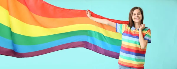 Mujer Joven Con Bandera Lgbt Sobre Fondo Turquesa — Foto de Stock