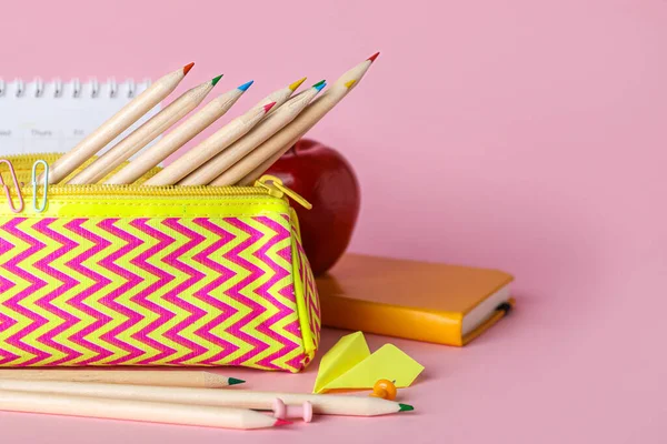 Case Pencils Paper Plane Apple Calendar Pink Background — Zdjęcie stockowe