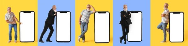 色とりどりの背景に大人の男と大きなスマートフォンのセット — ストック写真