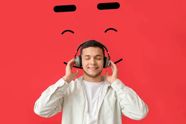 Joven Con Auriculares Sonrisa Dibujada Sobre Fondo Rojo — Foto de Stock