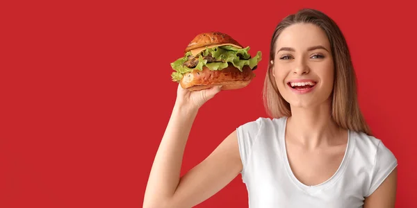 Beautiful Happy Young Woman Holding Tasty Burger Red Background — Stock Photo, Image