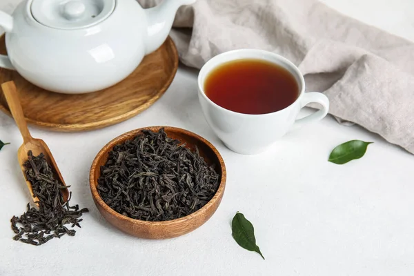 Composition Dry Tea Leaves Hot Beverage White Table — Stock Photo, Image