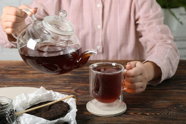 Woman Glass Pot Cup Puer Tea Wooden Table Closeup — Stock Photo, Image